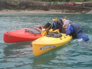 Rescue techniques for sit-on-top kayaks.