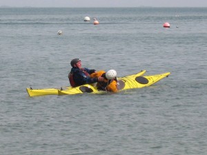 Unconscious paddler in kayak rescue technique