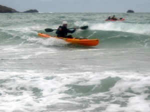 use of a low brace in kayak surf landing