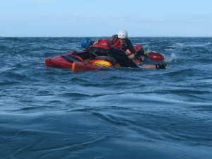 Sit on top kayak assited resuces in rough water