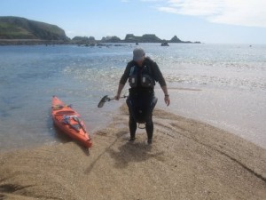 Kayaker sinking in to the Maerl or coralline algae beds in the Swinge.