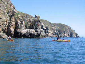 kayaks on the south coast cliffs of alderney