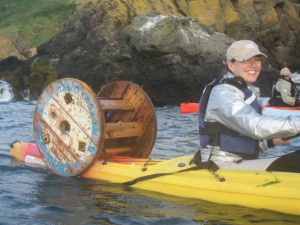 Collecting sea junk by kayak