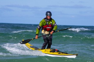 Simon Osbourne stand up kayak surfing